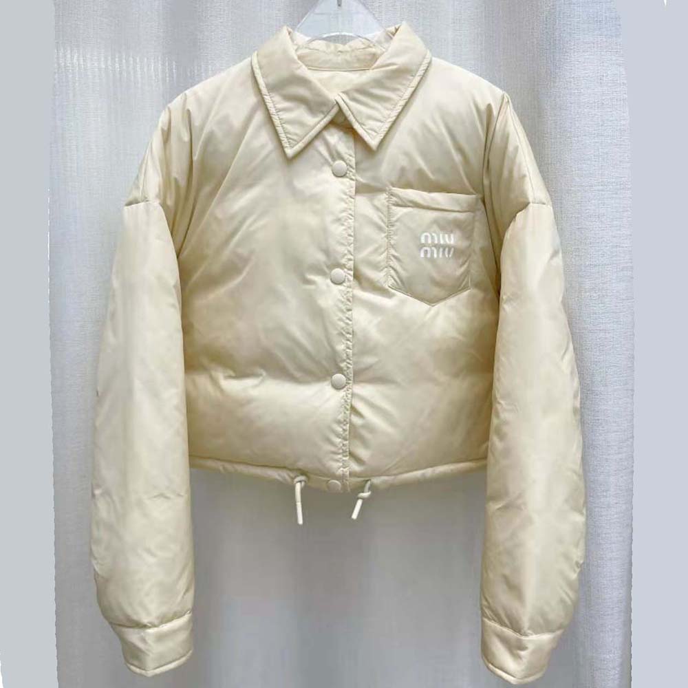 Close-up of zipper and branded hardware on Miu Miu Women Cropped Down Jacket