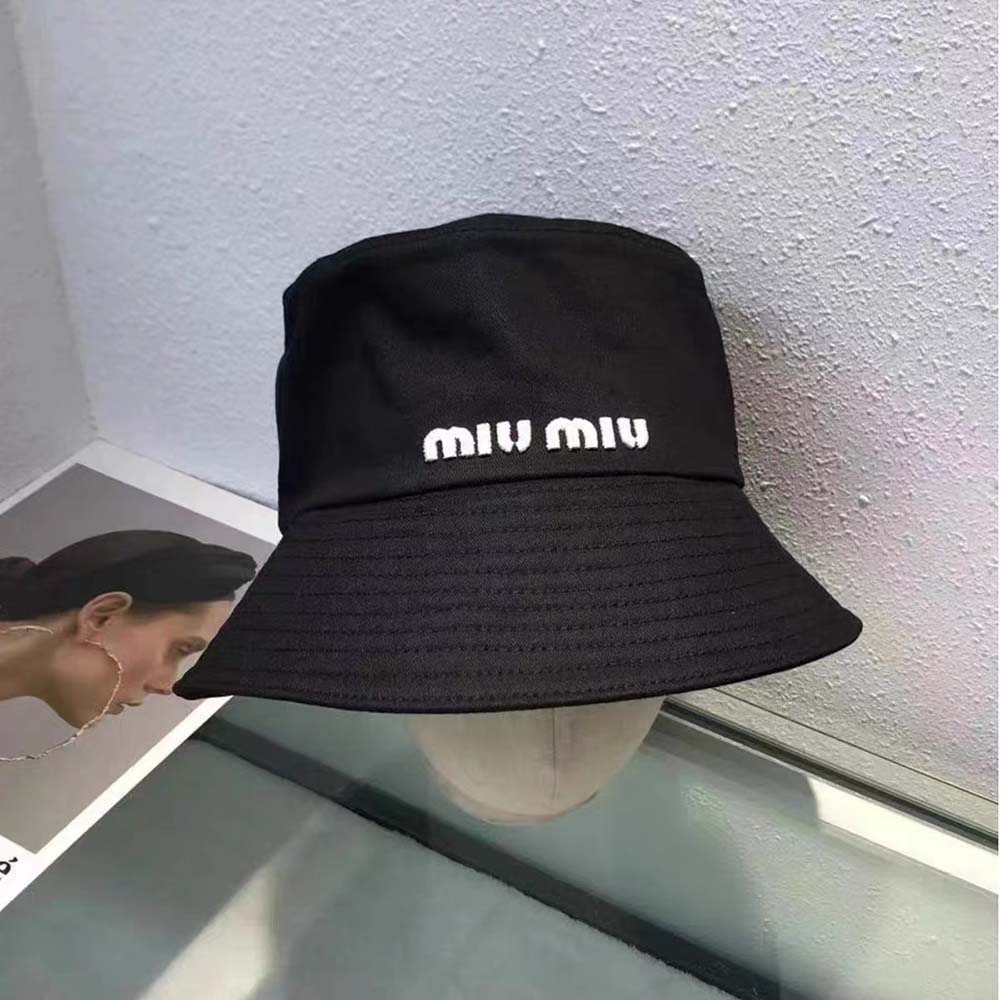 Side angle highlighting the black drill cotton texture on Miu Miu Women Drill Bucket Hat