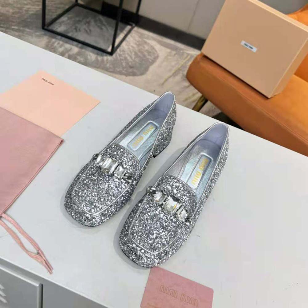 Close-up of fabric logo label on Miu Miu Women Glitter Fabric Loafers