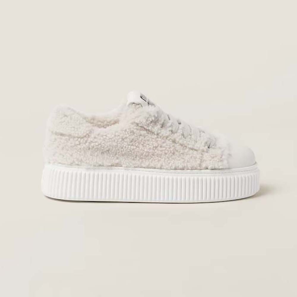 Side view of Miu Miu Women Shearling Sneakers with EVA Sole with Logo
