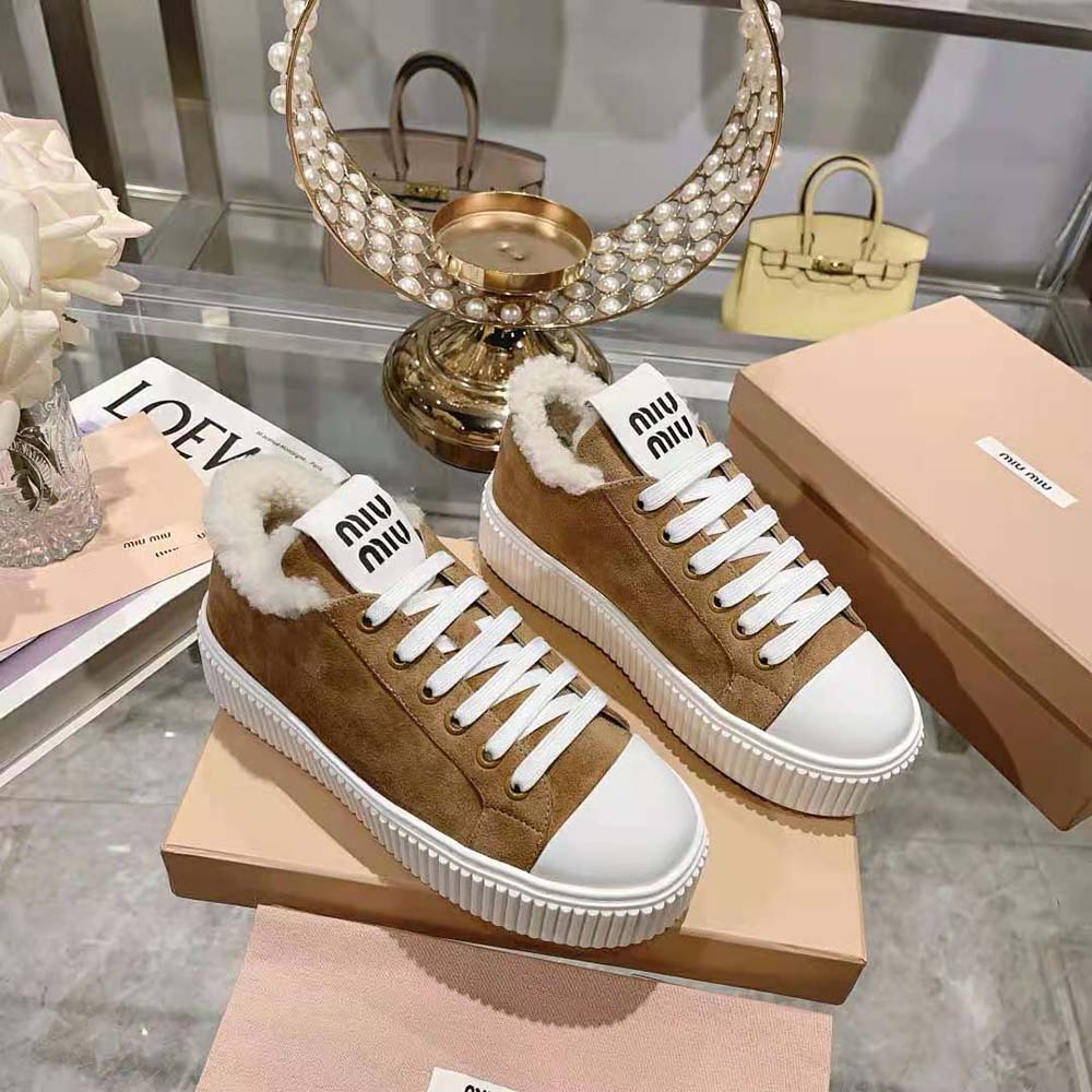 Top view showcasing lacing and EVA sole of Miu Miu Women Suede Sneakers
