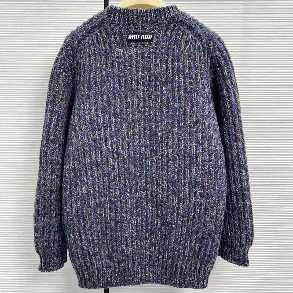 Side angle showing relaxed fit of Miu Miu Women Wool Sweater with Knit Logo Patch-Blue