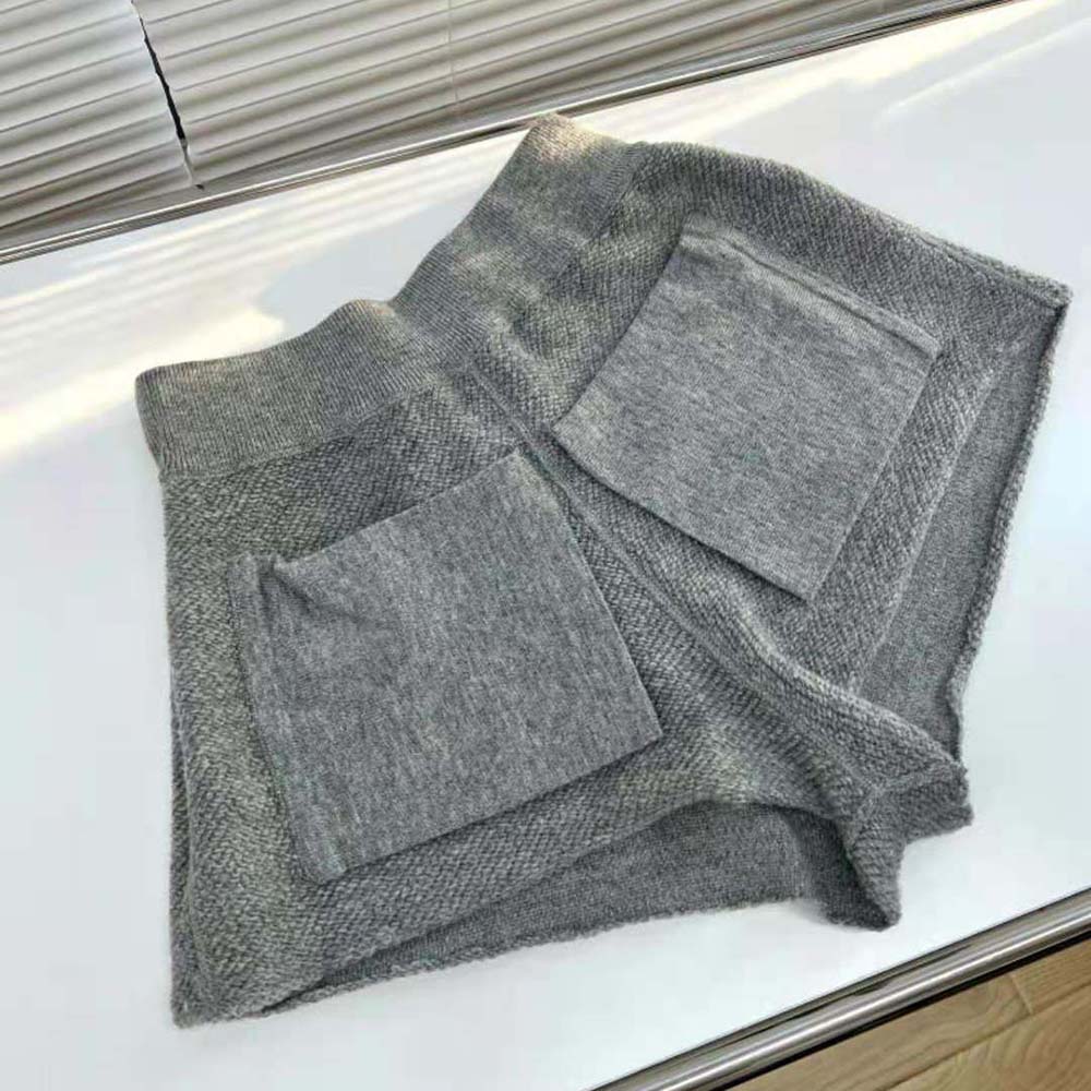 Side angle showcasing tailored fit of Miu Miu Women Wool and Cashmere Shorts