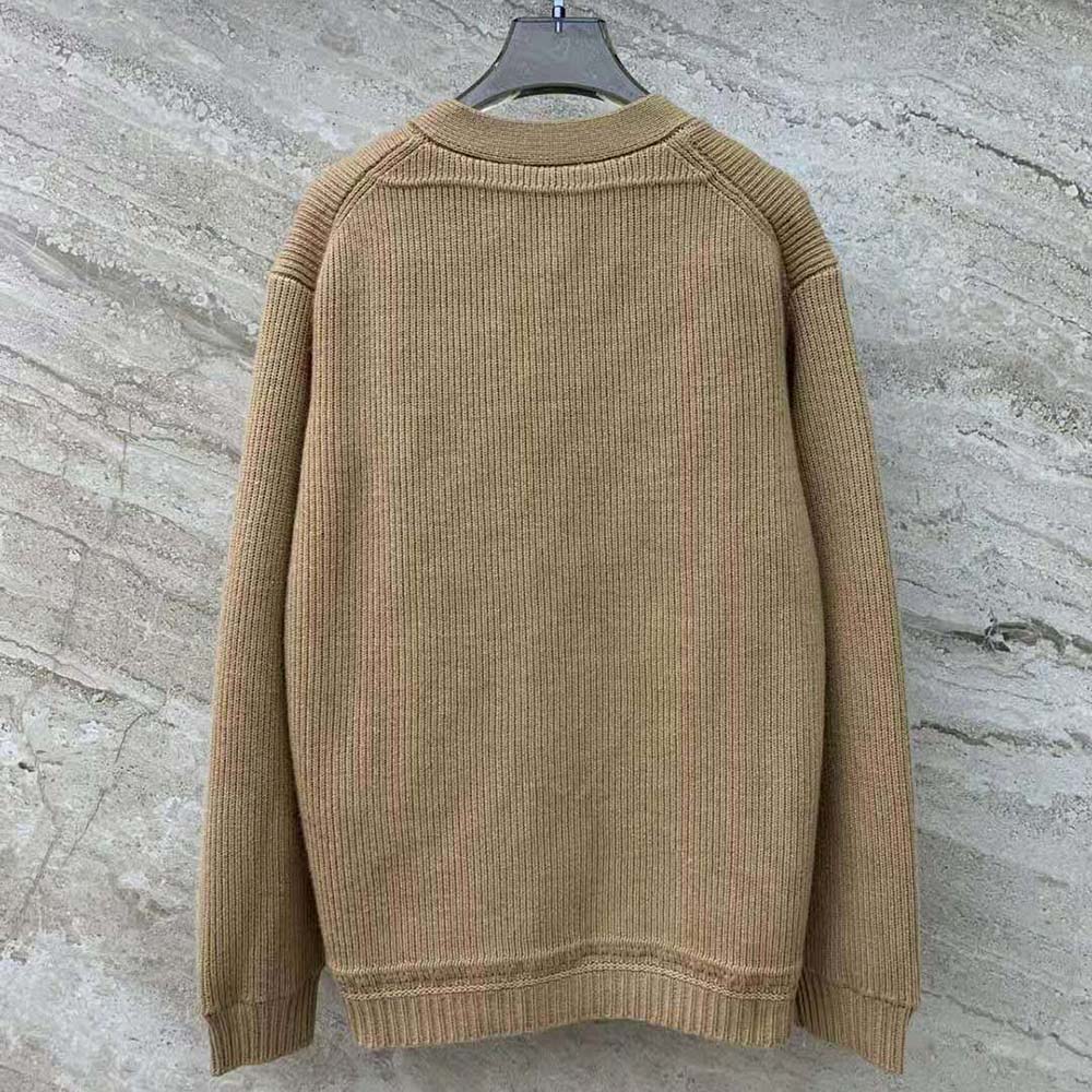 Side angle showing relaxed fit of Miu Miu Wool and Nylon Knit Cardigan-Beige