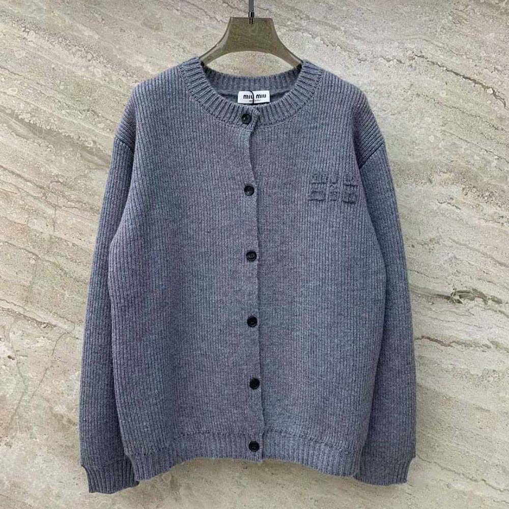 Close-up detail of Miu Miu Women Wool and Nylon Knit Cardigan-Silver buttons and knit texture