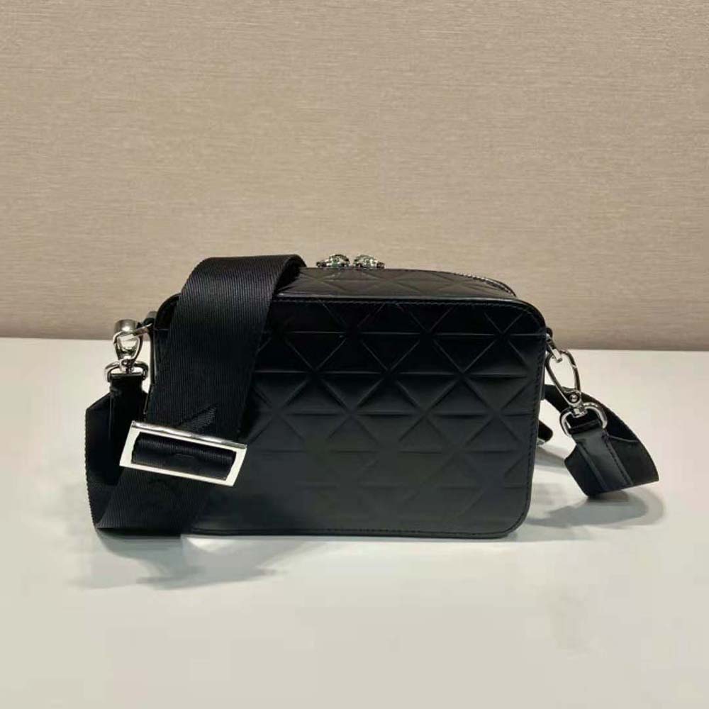 Side angle showing adjustable shoulder strap and silver-tone hardware