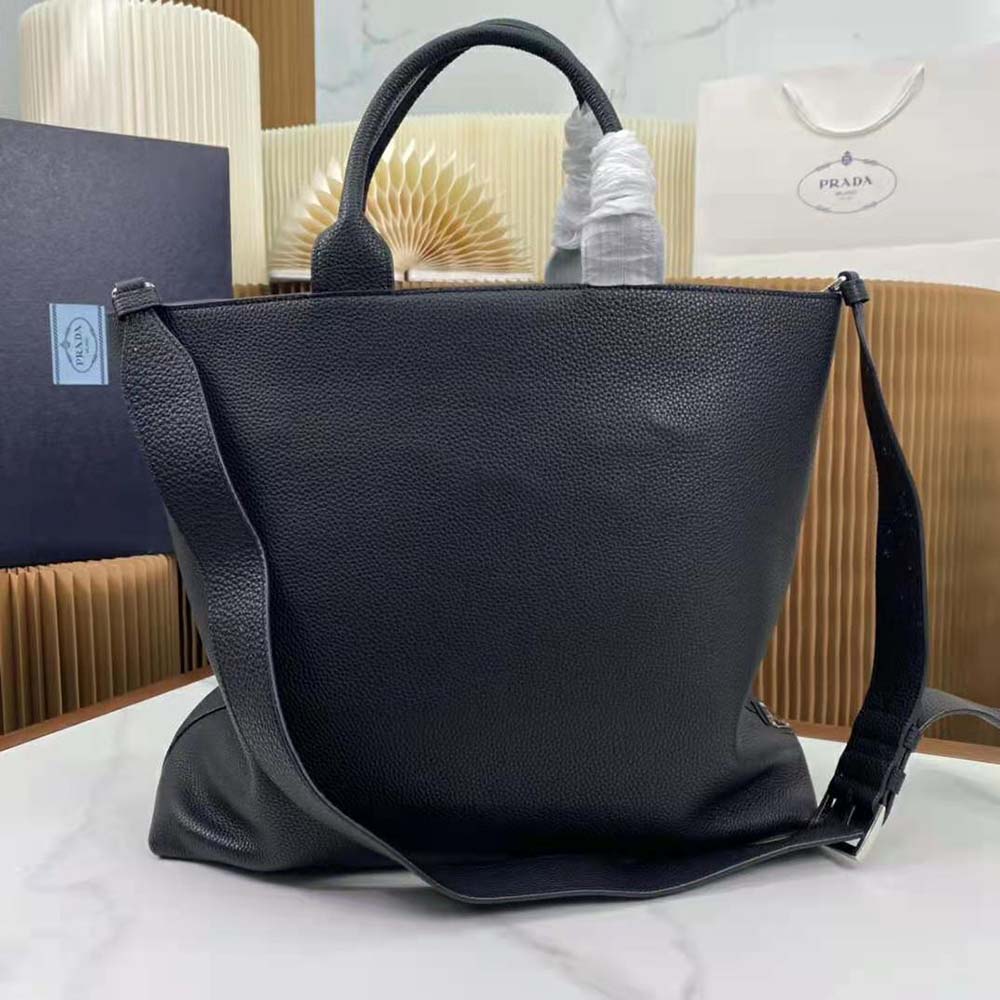 Side profile showing zipper closure of Prada Men Leather Tote with black leather