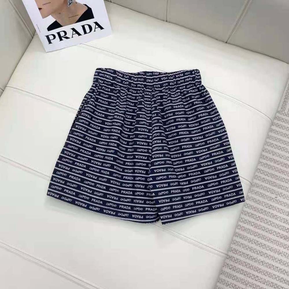 Side angle of Prada Women Nylon Shorts-Blue/White highlighting silhouette