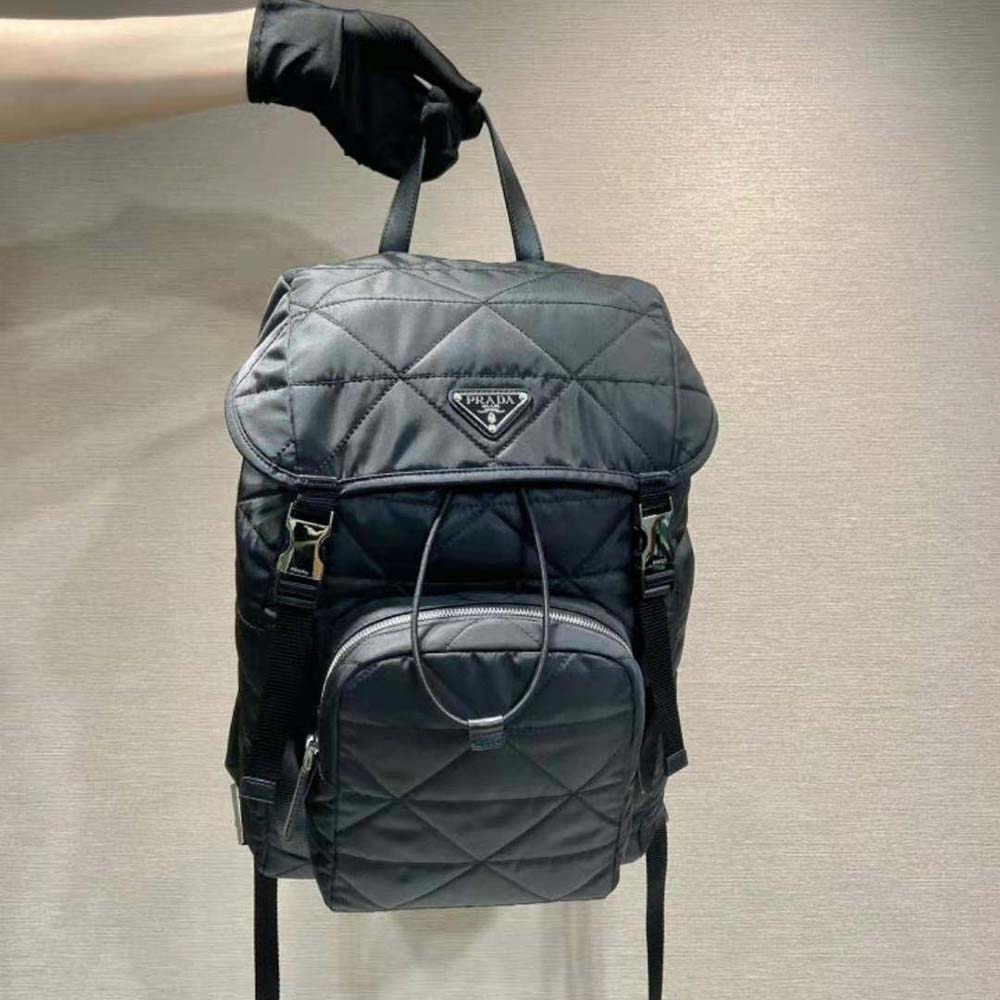 Close-up of topstitching and matte hardware on Prada Men Re-Nylon Backpack