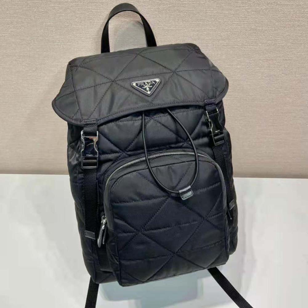 Side profile showing adjustable straps on Prada Men Re-Nylon Backpack