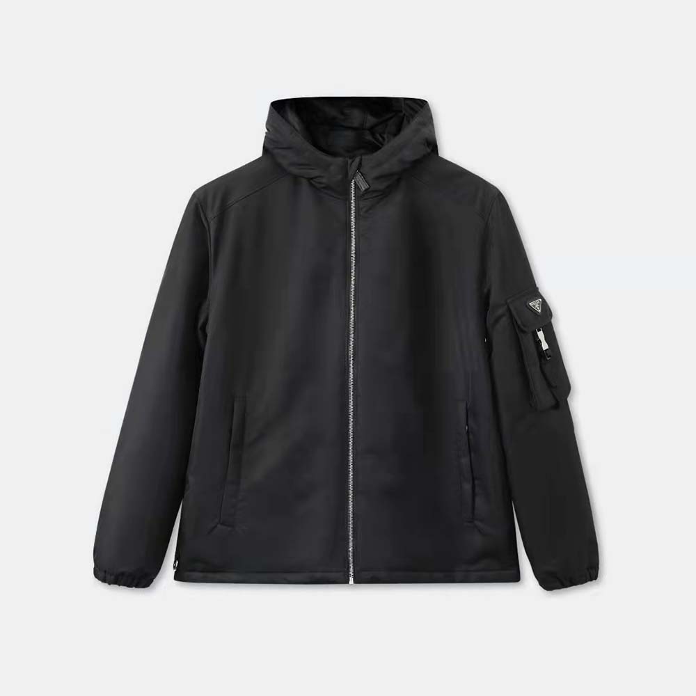 Close-up on Prada branded metal hardware of the Re-Nylon Blouson Jacket-Black