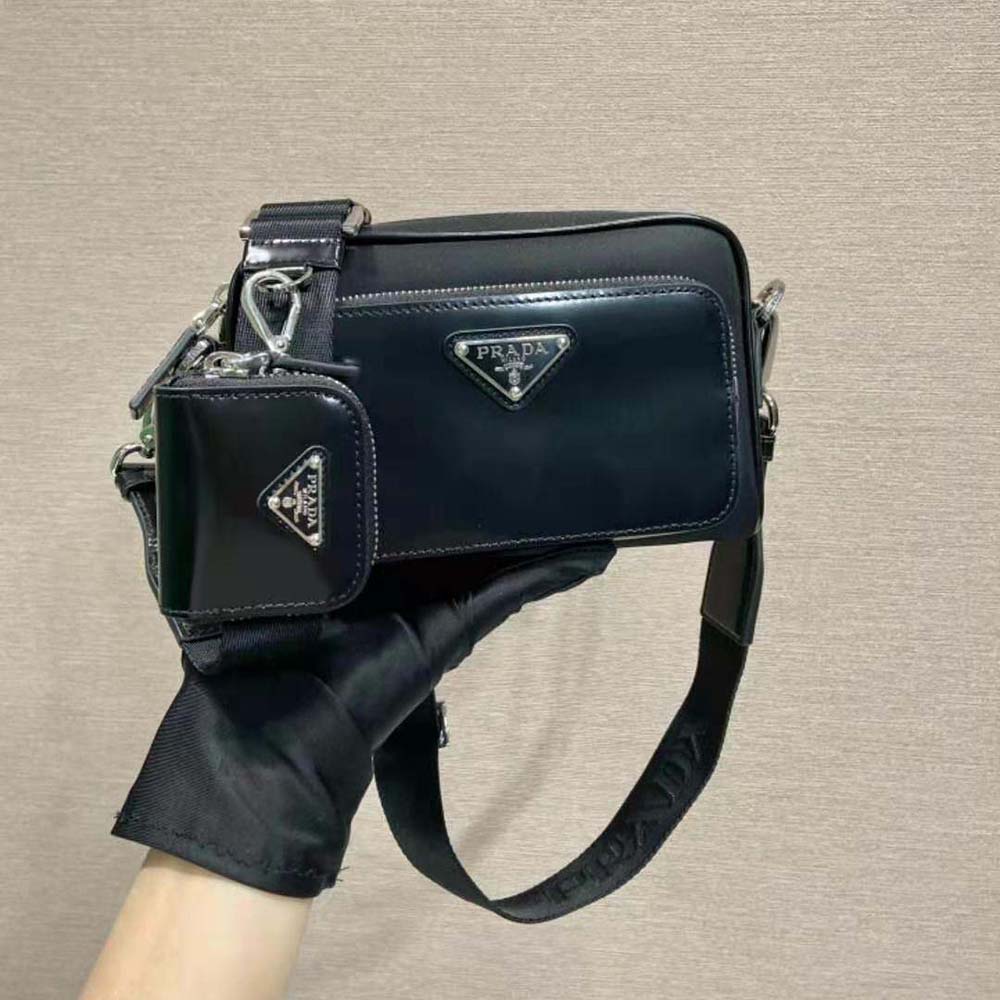 Close-up of brushed leather and silver hardware on Prada shoulder bag