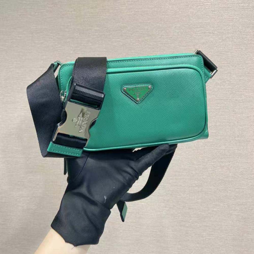 Close-up of green saffiano leather texture and silver hardware