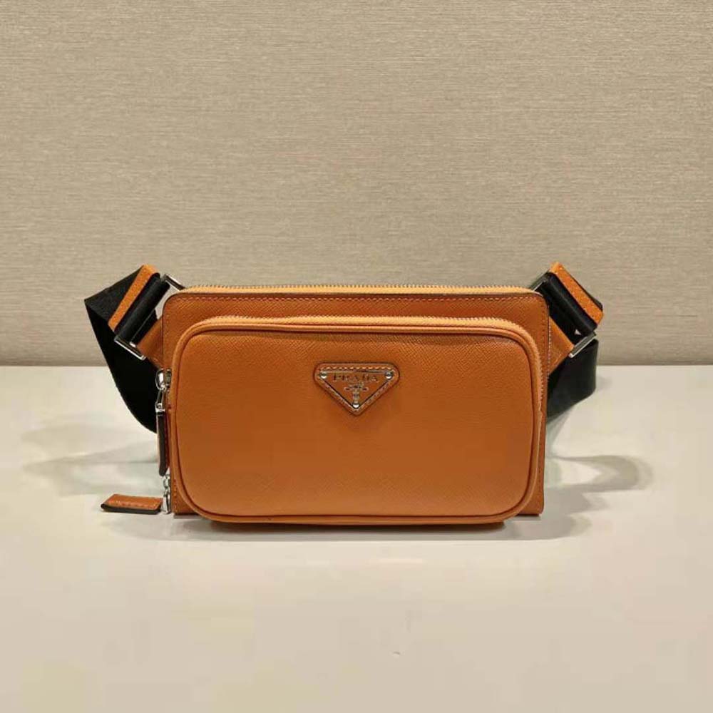 Side profile showing adjustable strap on Prada Men Saffiano Leather Belt Bag-Orange