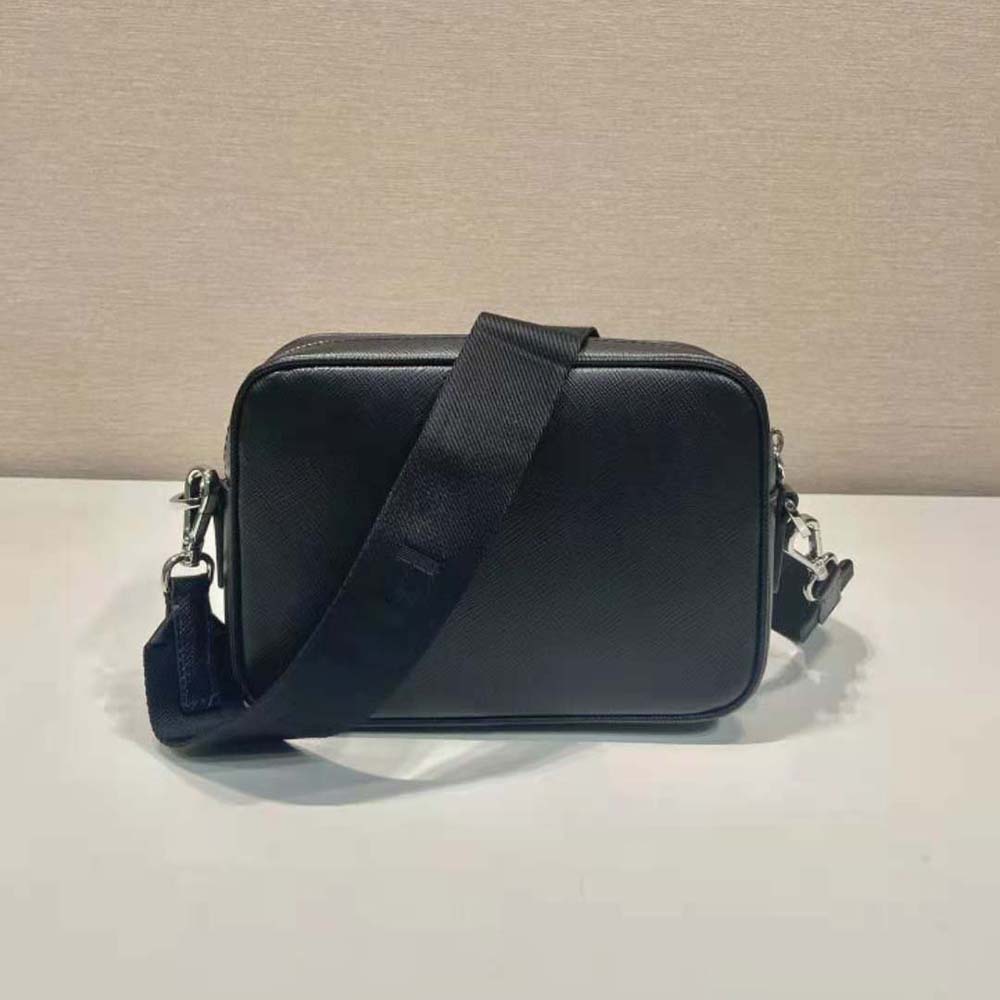 Side profile of Prada Men Saffiano Leather Shoulder Bag-Black with strap detail