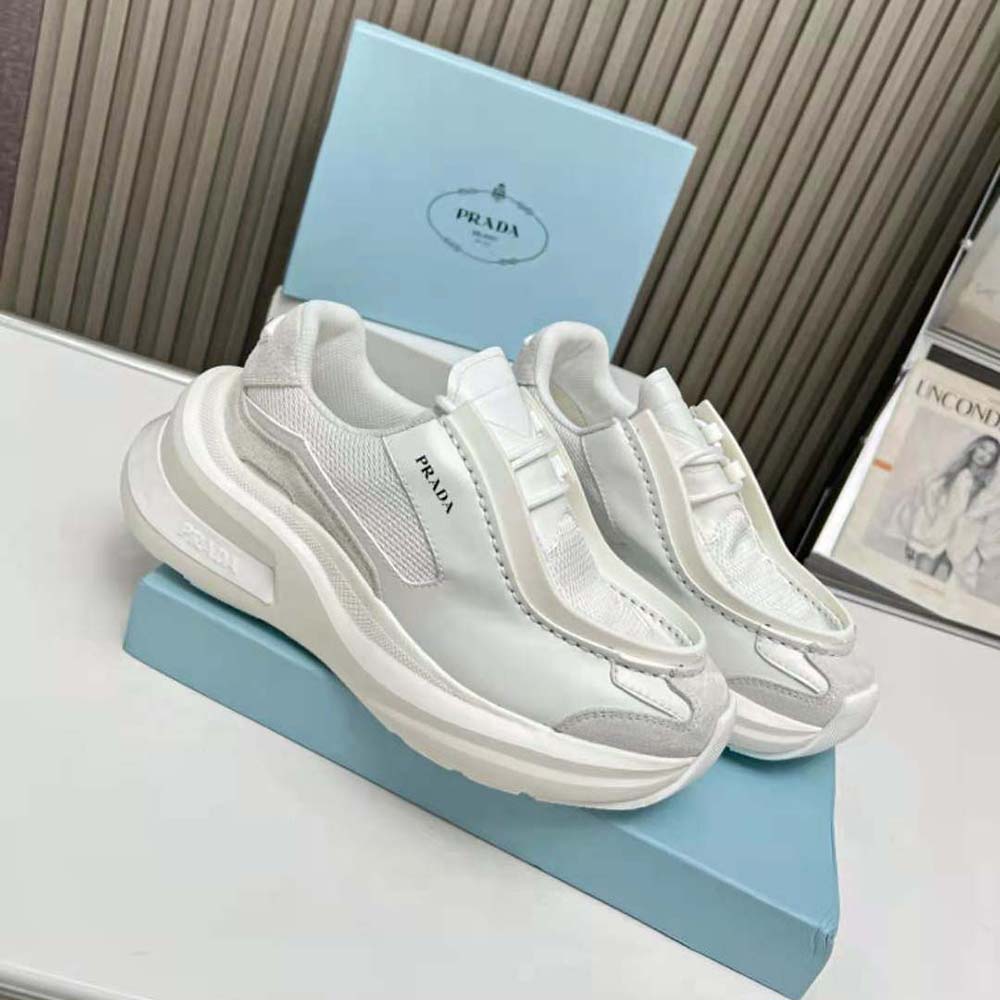 Close-up detail of brushed leather and suede on Prada Men Systeme Sneakers in white