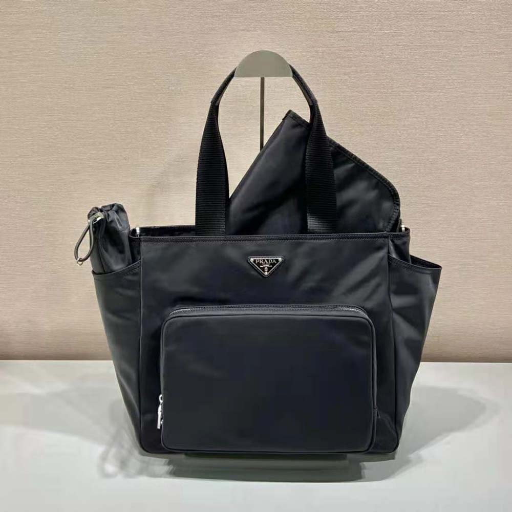 Close-up of silver hardware and triangle logo on Prada Re-Nylon Baby Bag