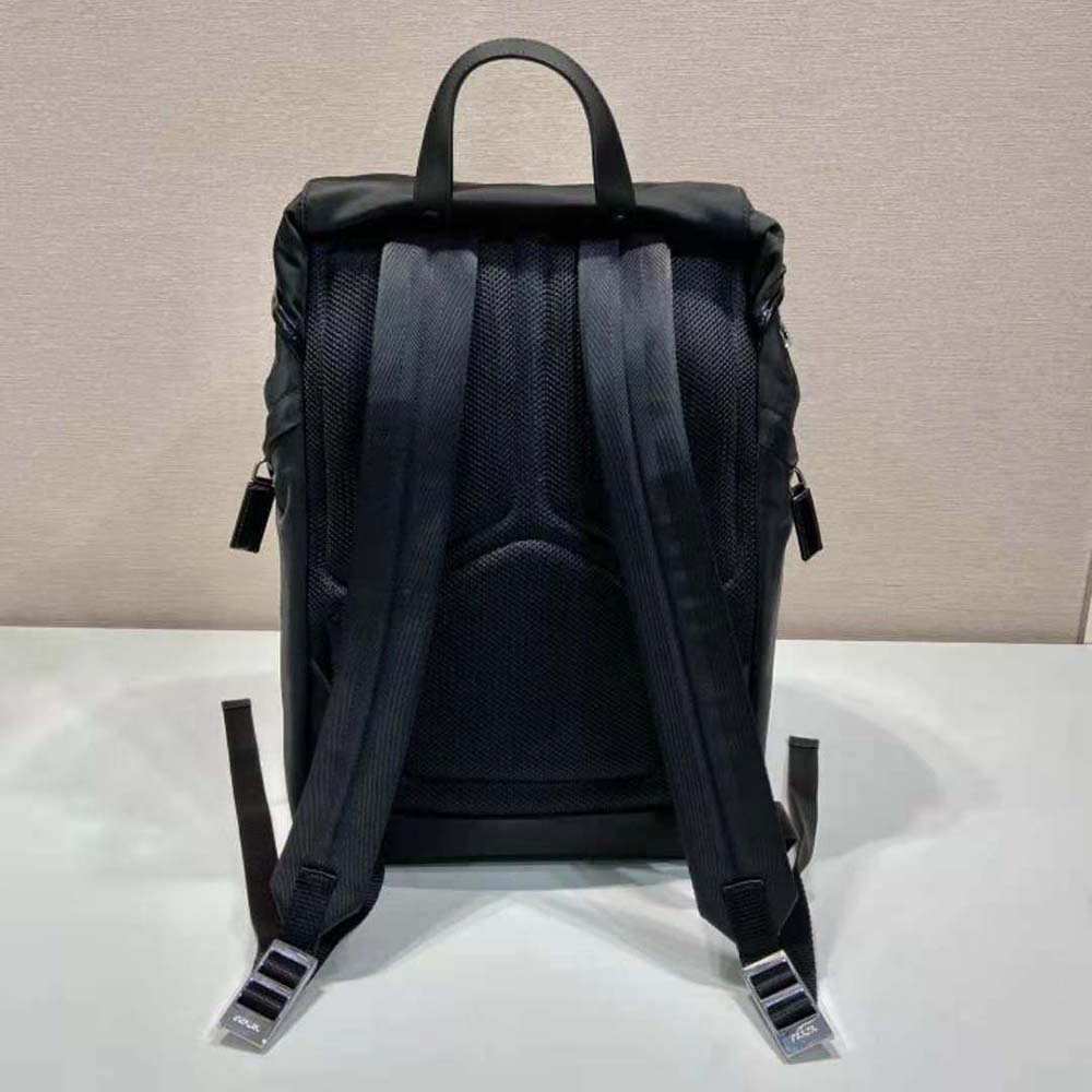 Side angle showing matte hardware on Prada Re-Nylon backpack