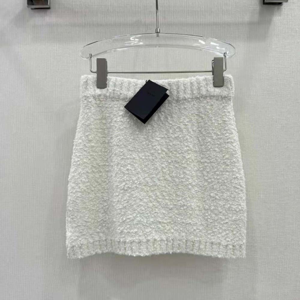 Side angle highlighting silhouette of Prada Women Bouclé Mohair Miniskirt-White
