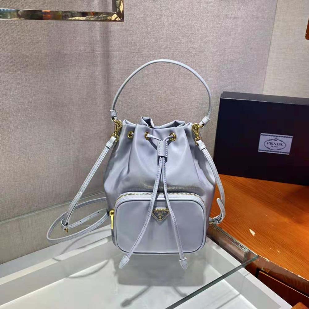Close-up of silver hardware on Prada Women Duet Re-Nylon Bucket Bag-Blue