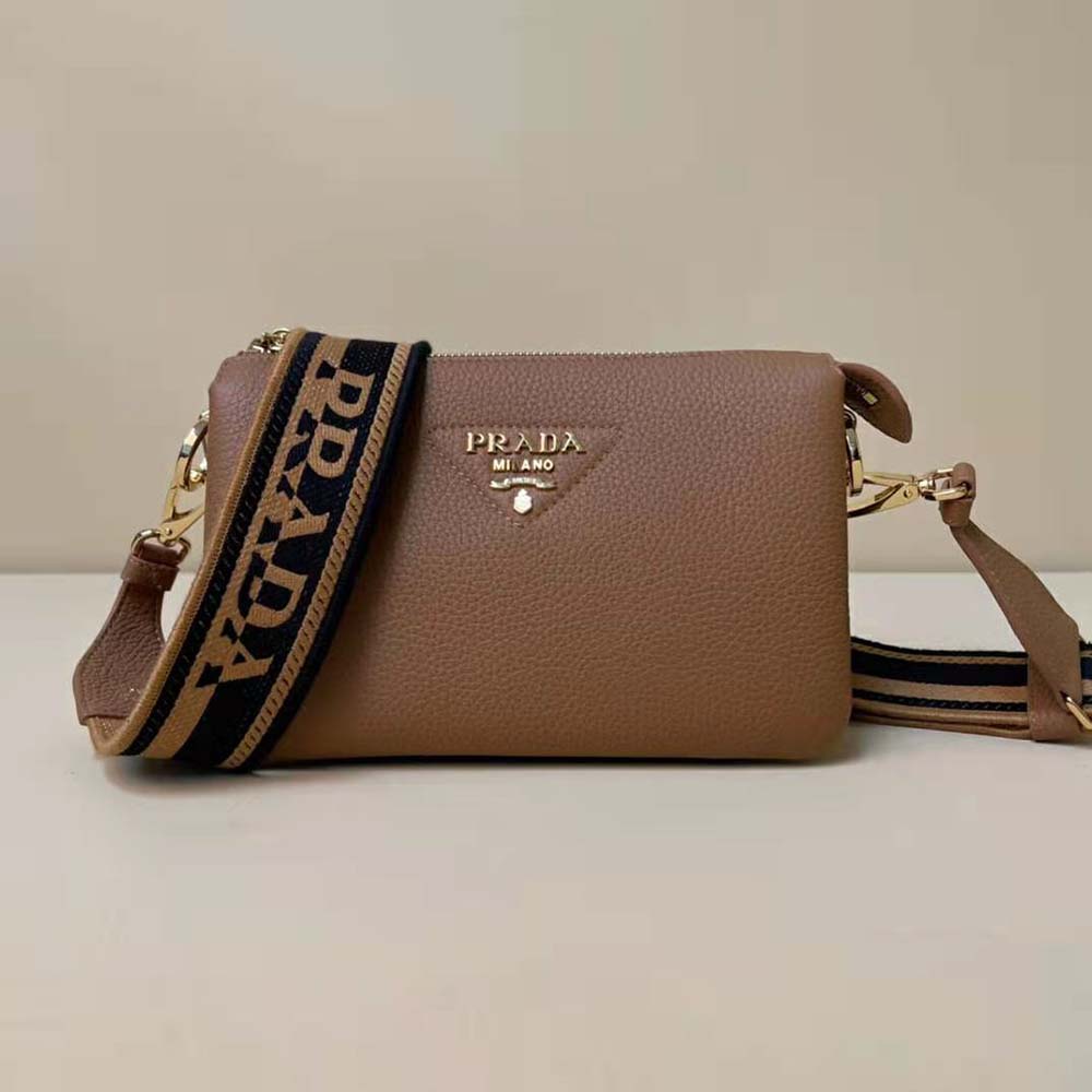 Close-up of metal logo detailing on Prada Women Leather Shoulder Bag Brown