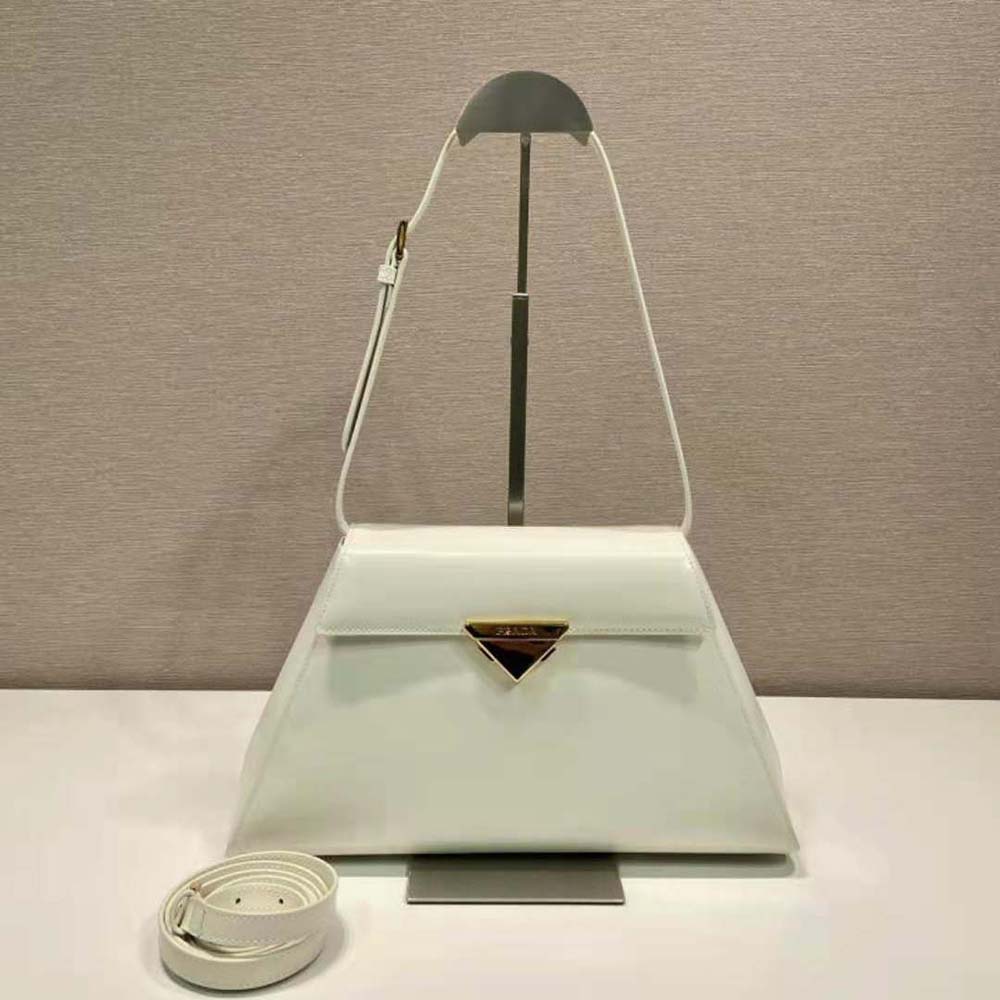 Close-up on silver-tone hardware and Prada logo detail