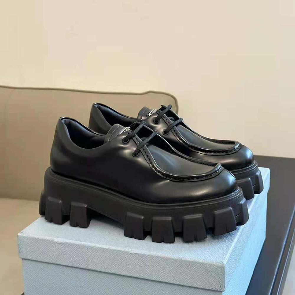 Close-up of brushed leather texture on Prada Women Monolith lace-ups