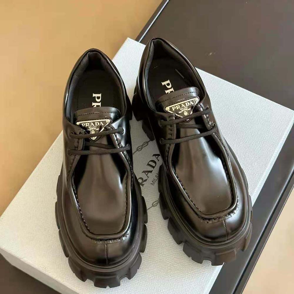 Overhead view showing laces and platform sole of Prada Women Monolith shoes