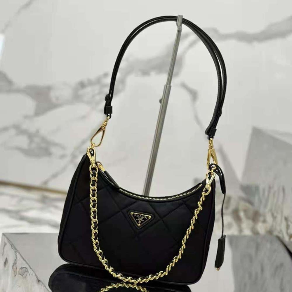Close-up of silver chain closure on Prada Women Re-Edition 1995 Mini-bag
