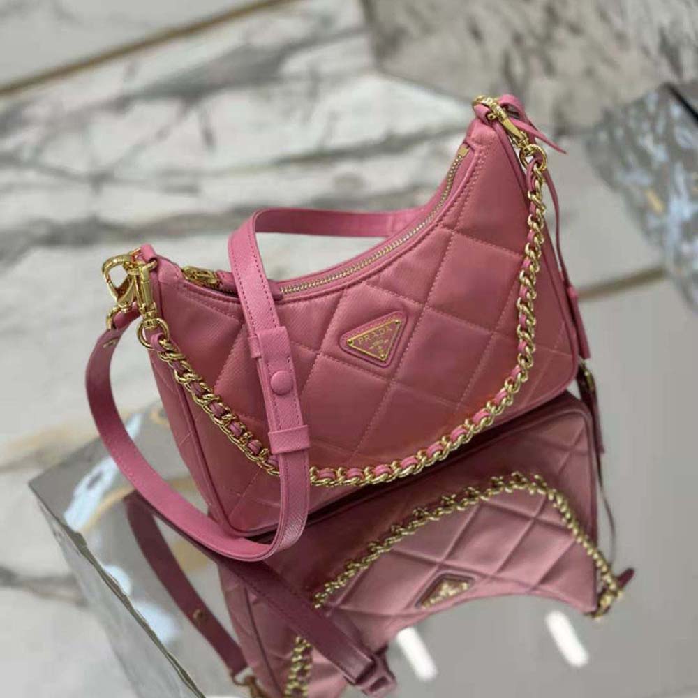 Side angle showing silhouette of Prada Women Re-Edition 1995 Chaîne Re-Nylon Mini-bag-Pink
