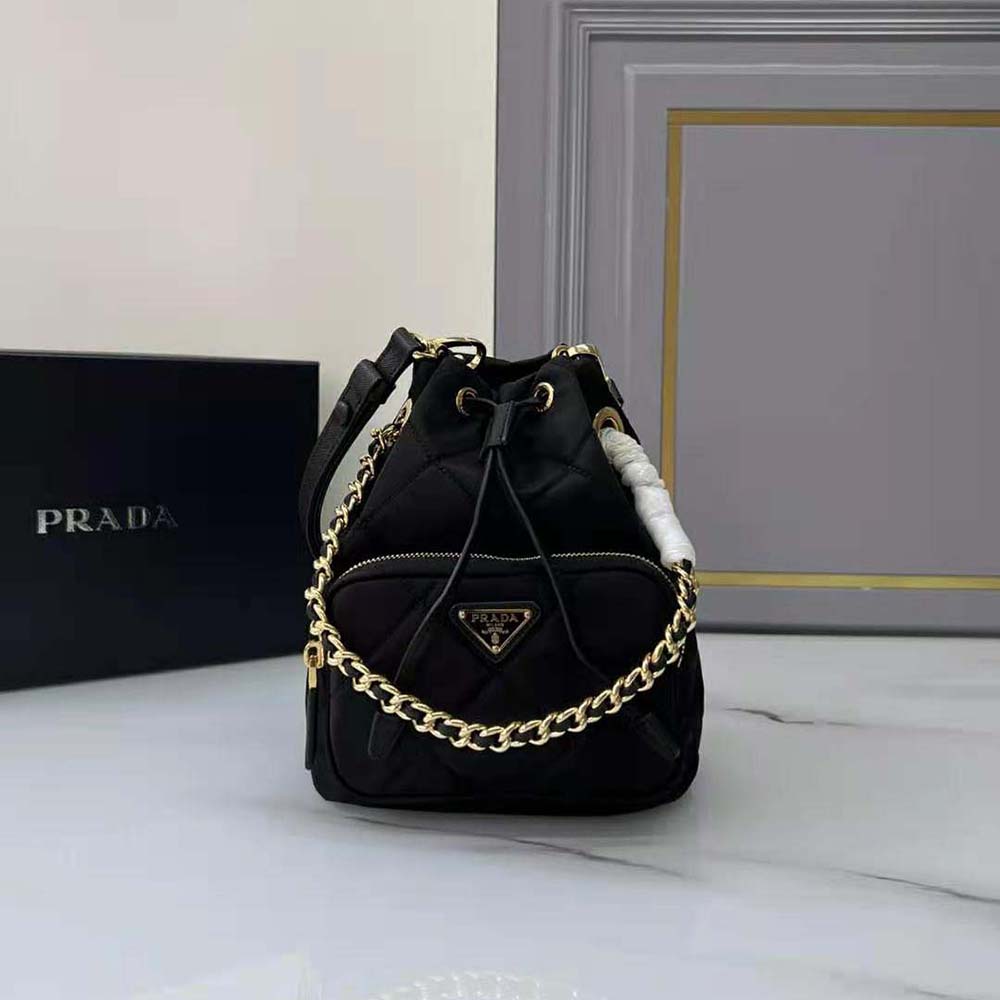 Side profile showing black nylon texture of Prada Women Re-Edition 1995 Shoulder Bag