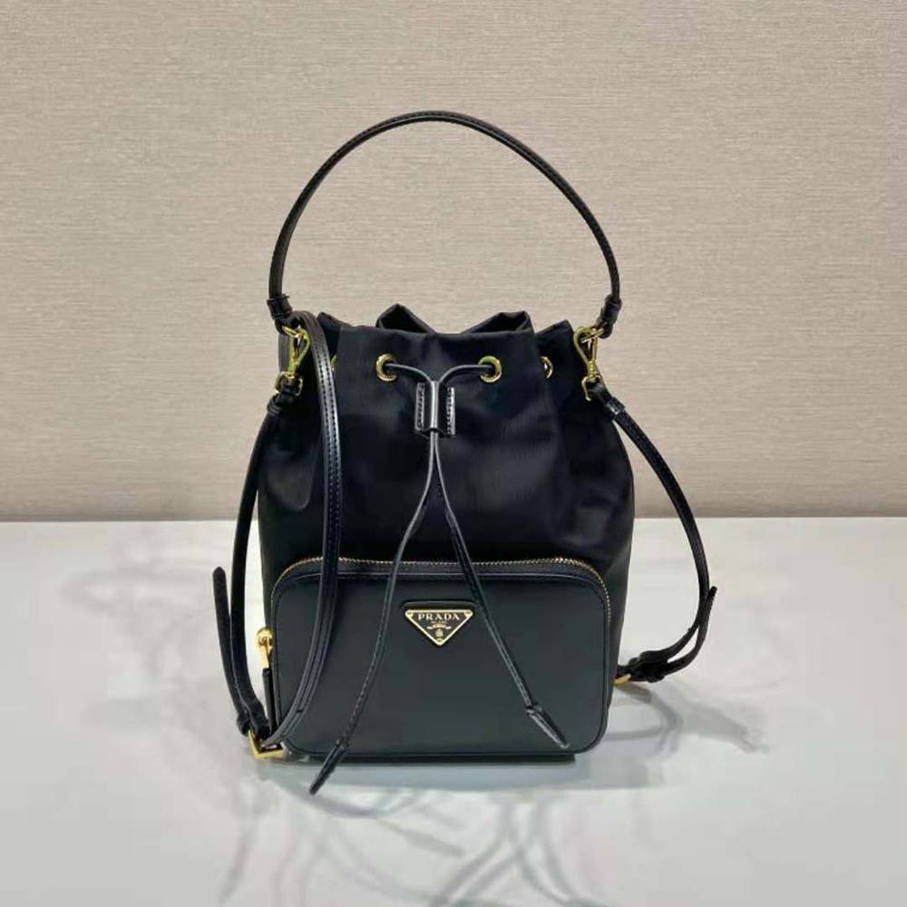 Close-up of brushed leather and silver hardware on Prada bag