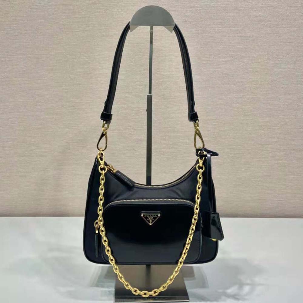 Close-up on brushed leather and silver hardware detail Prada mini-bag