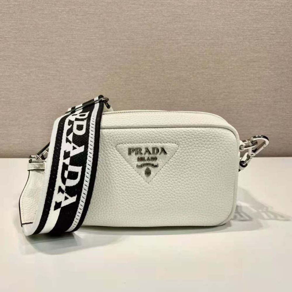 Close-up of smooth leather and silver hardware on Prada bag