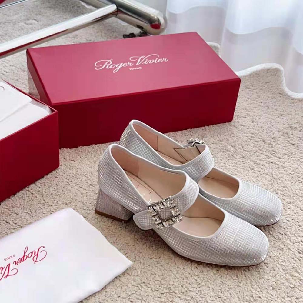 Top-down view showing sleek silhouette of Roger Vivier silver low heel pumps