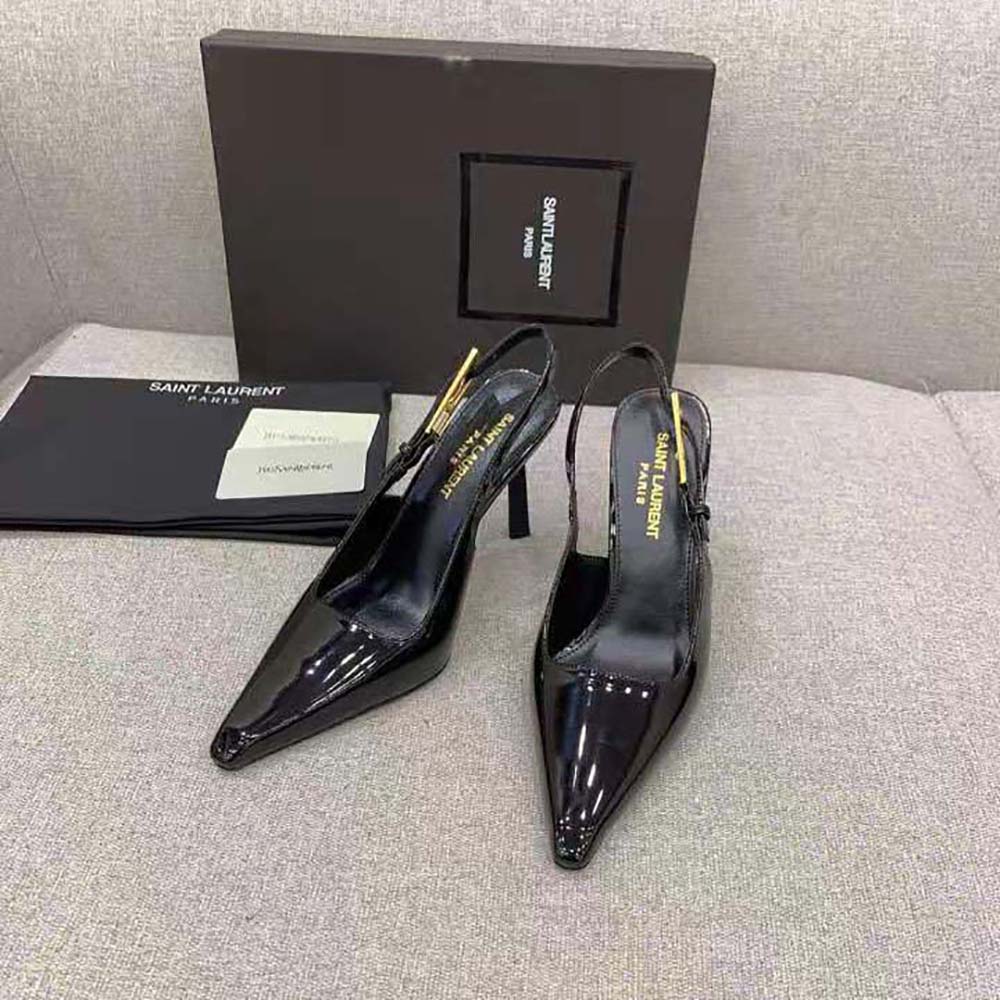 Close-up of gold YSL logo hardware on Saint Laurent Lee Slingback Pumps