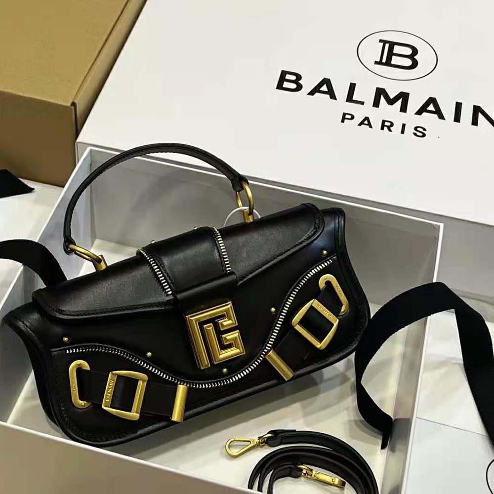 Close-up of Balmain Women Blaze Clutch Bag gold-tone hardware detail