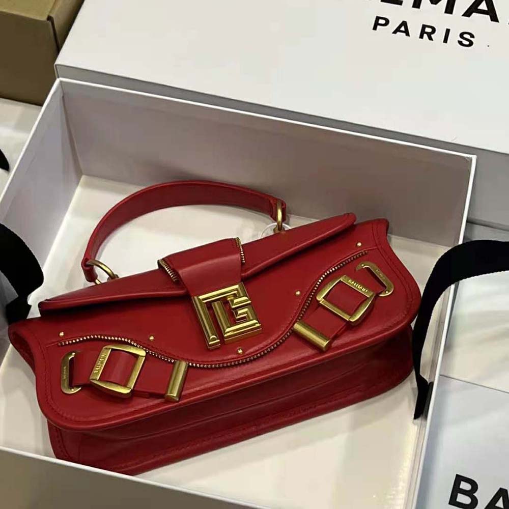 Side angle showing sleek silhouette of Balmain Women Blaze Clutch Bag