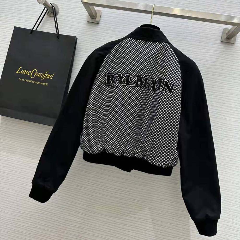 Side profile showcasing silhouette of Balmain Women Cropped Balmain Jacket