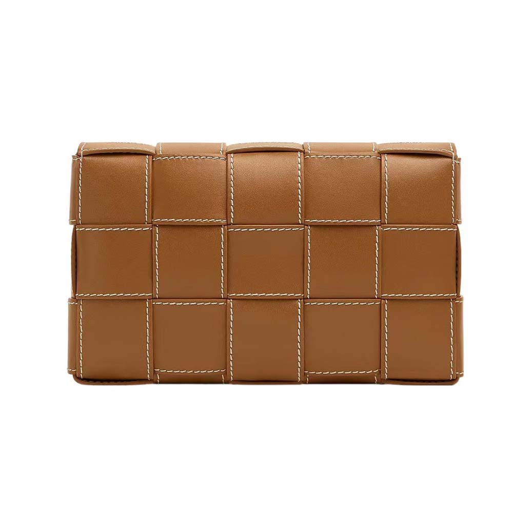 Side view showing gold-tone hardware on Bottega Veneta Men Cassette Medium Bag