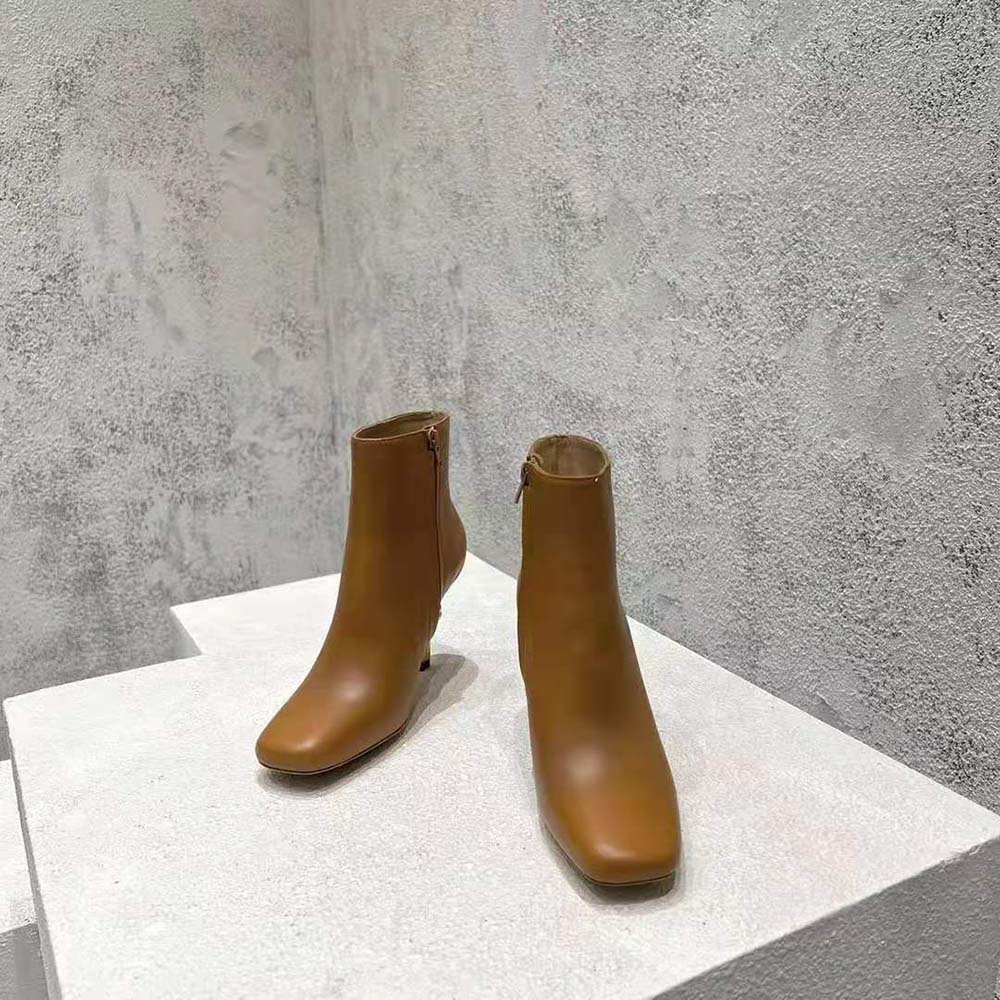 Front angle highlighting silhouette of Bottega Veneta Women Knot Ankle Boot-Brown