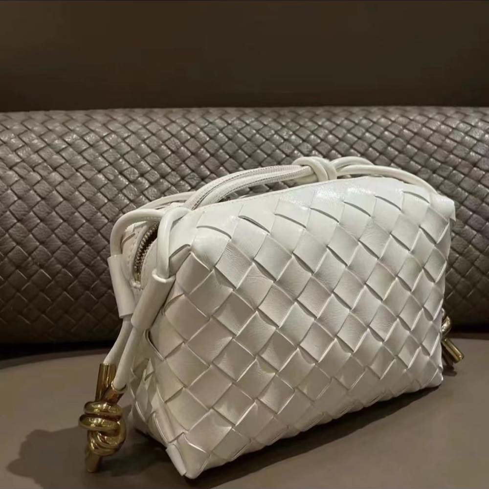 Side profile showing silver hardware on Bottega Veneta Women Mini Loop Camera Bag