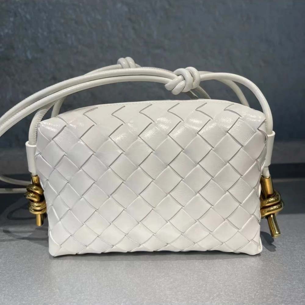 Close-up of intrecciato leather detail on Bottega Veneta Mini Loop Camera Bag