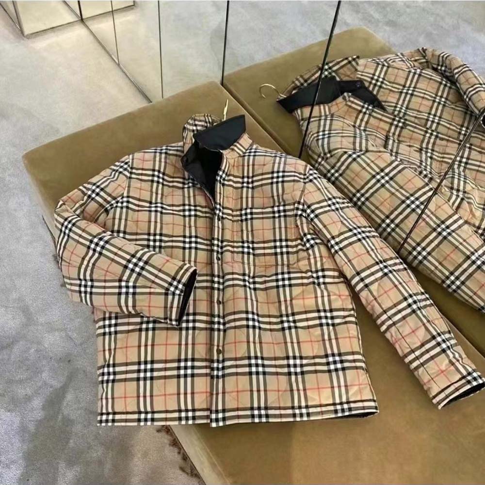 Side angle showing button closure on Burberry Men Reversible Thermoregulated Overshirt