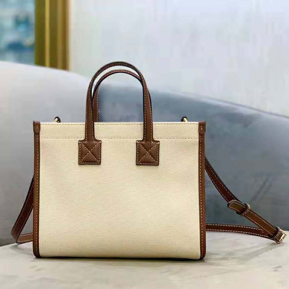 Side angle showing structured silhouette of Burberry Women Mini Freya Tote-Beige