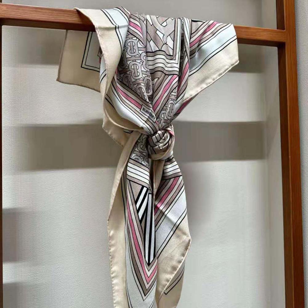 Flat lay of Burberry Women Montage Print Silk Square Scarf-Pink displaying full square shape