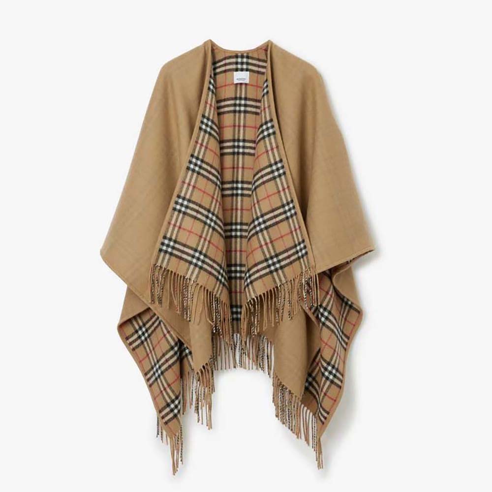 Front view of Burberry Women Reversible Check Wool Cape-Beige draped elegantly