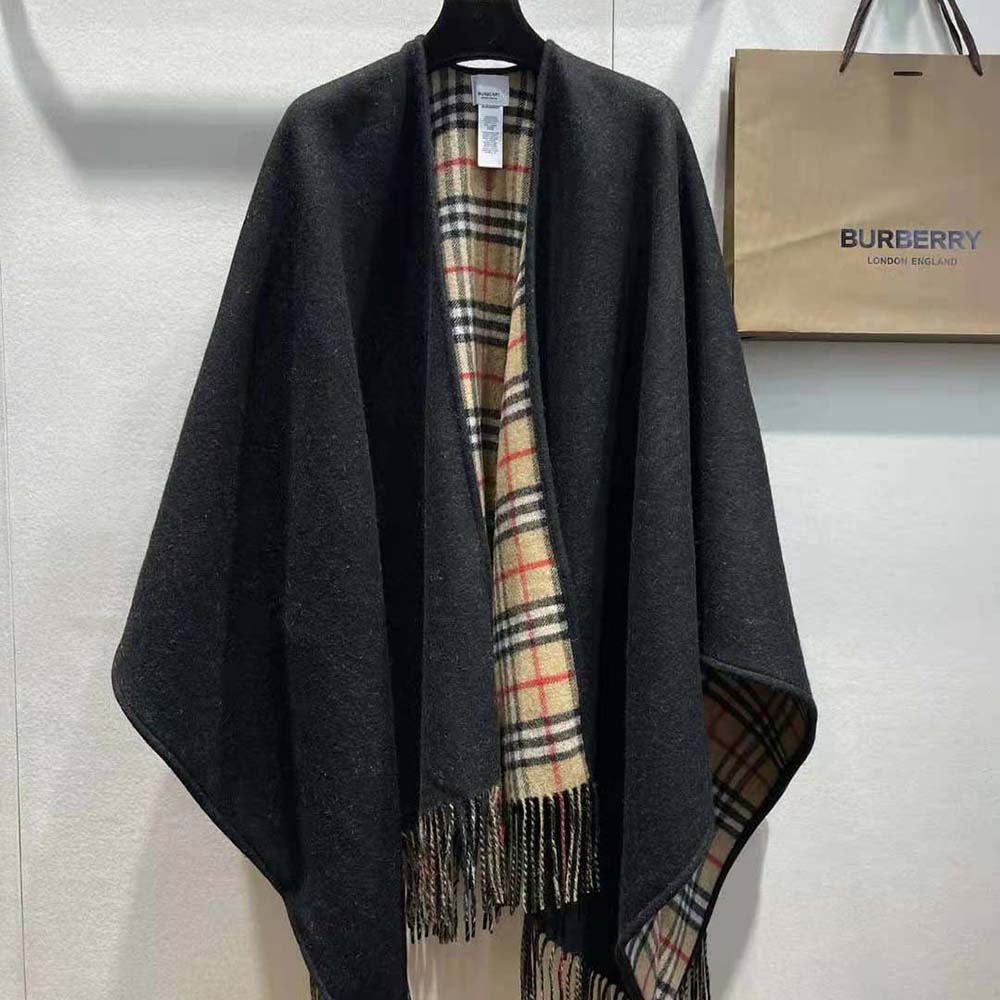 Close-up of Burberry check pattern on reverse of wool cape
