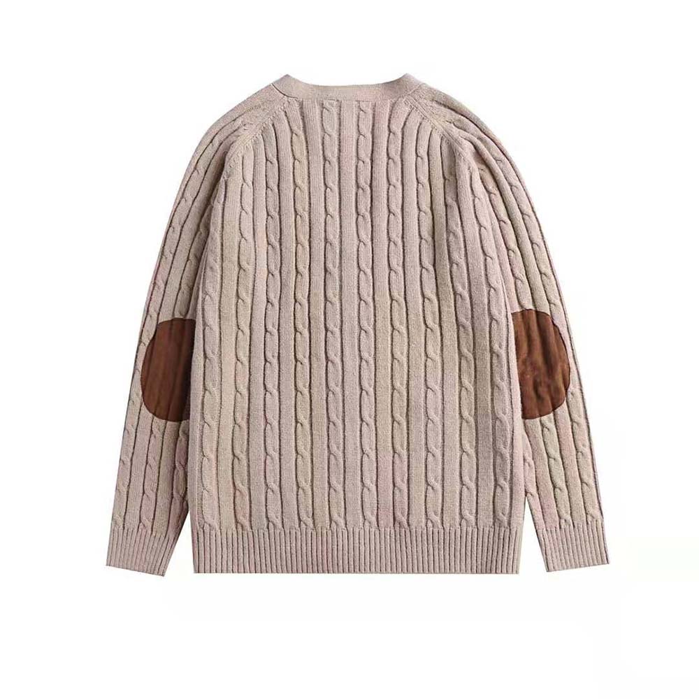 Side angle showing silhouette and button closure of Celine cashmere cardigan