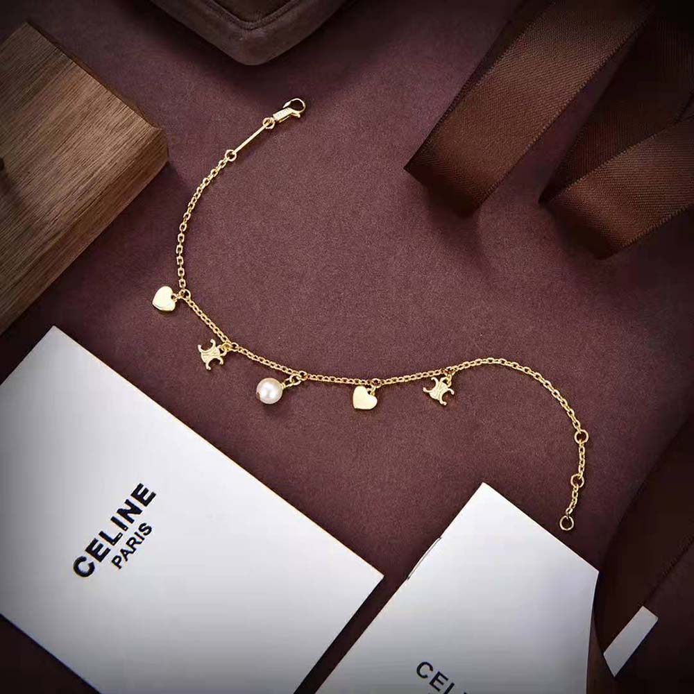 Full front view of Celine Women Cœur Celine Charms Necklace with gold finish